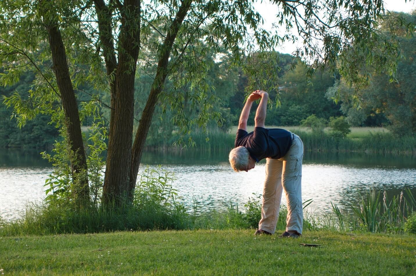 man stretching outside